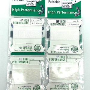 May include: Three packages of white bead cord, labeled "HP High Performance" with the Griffin logo. The packages are labeled with the length of the cord, 2 meters, and the size of the cord, 0.50 mm, 0.60 mm, and 0.75 mm. The packages are labeled "For stringing pearls and beads".