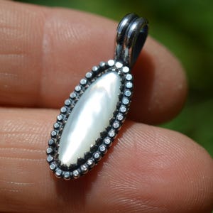 Handmade sterling silver pendant with mother of pearl
