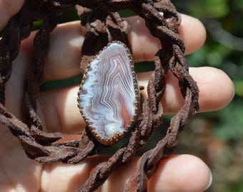 Handmade copper and leather bolo tie featuring agate