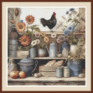 May include: A vintage-style kitchen shelf with a rooster figurine, various blue and white ceramic containers, and a wooden box labeled "BEHIND THE GARDENS".