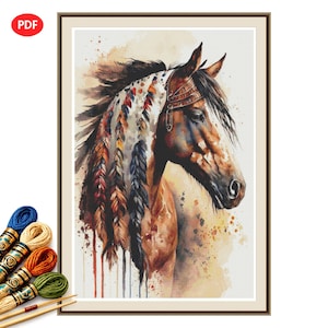 May include: A cross stitch pattern featuring a brown horse adorned with a decorative headpiece of colorful feathers. The artwork uses watercolor-style splashes in shades of brown, orange, and blue. Five skeins of embroidery floss are shown below.