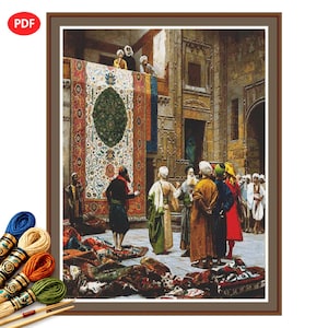 Pode incluir: Um padrão de ponto cruz com uma reprodução de uma pintura orientalista mostrando um grupo de pessoas em trajes tradicionais reunidas num pátio com um tapete grande, ornamentado e colorido pendurado numa parede e vários tapetes no chão.