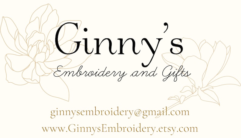 May include: A logo featuring the black text Ginny's Embroidery and Gifts centered above an email address and website URL. The design is framed by two light brown line-art illustrations of magnolia flowers on a cream-colored background.