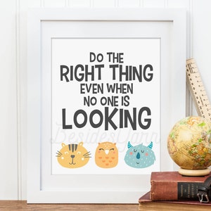 May include: A framed print with the text "Do the right thing even when no one is looking."  The print features three cartoon animal faces: a cat, an owl, and a monster.