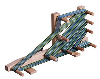 Ashford Inkle Loom for weaving warp faced bands, straps, laces, and other narrow pieces. Easy to warp and weave!