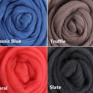 May include: Four samples of wool roving in different colors: classic blue, truffle, coral, and slate.