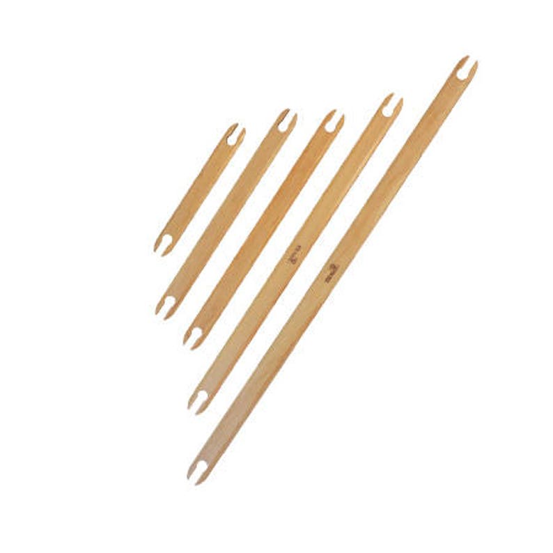 May include: Set of five wooden knitting needles in various sizes. The needles are made of natural wood and have a smooth finish.