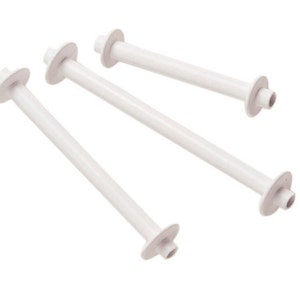 May include: Four white plastic bobbins for a spinning wheel. The bobbins are different sizes and have a smooth, cylindrical shape.