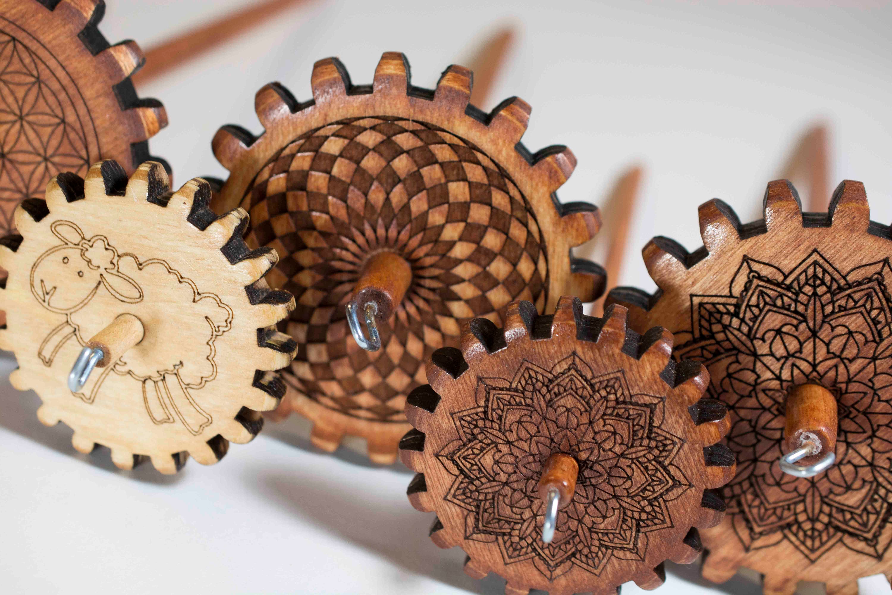 Snyder Gear Spindles in various sizes and designs, Mandala, Sheep, Checker, Flower, Celtic