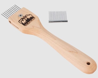 Schacht Duet Tapestry Beater with interchangeable metal combs, for packing weft in weaving.