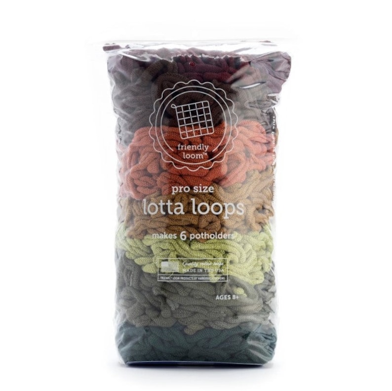 May include: A clear plastic bag filled with colorful, looped yarn. The bag features the text "friendly loom" and "lotta loops," indicating a craft kit for making potholders. The yarn colors include shades of brown, orange, pink, green, and gray.