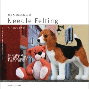 May include: The Ashford Book of Needle Felting: Revised Edition, a book cover featuring a brown and white beagle dog and a brown teddy bear. The book title is in white text on a red background. The text "Inspirational Projects Stretching the Boundaries of Needle Felting" is in black text on a white background. The author's name, Barbara Allen, is in black text on a white background.