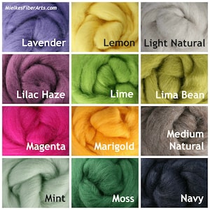 May include: A color chart of wool roving in 12 different colors, including lavender, lemon, light natural, lilac haze, lime, lima bean, magenta, marigold, medium natural, mint, moss, and navy.