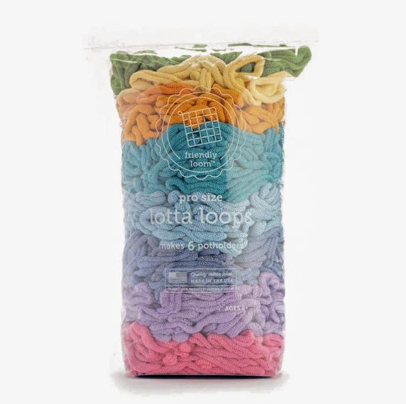 May include: A clear plastic bag filled with colorful, looped yarn. The yarn is arranged in horizontal bands of green, yellow, orange, teal, light blue, lavender, and pink. Text on the bag reads "friendly loom" and "pro size lotta loops makes 6 potholders."