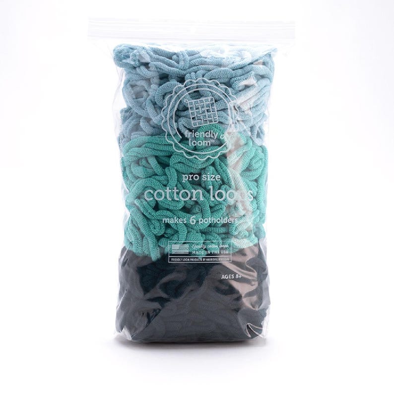 May include: A clear plastic bag filled with pro size cotton loops in shades of blue, teal, and black. The bag has a white label with the text "friendly loom" and "makes 6 potholders". The product is for ages 8+.