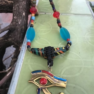 Ancient Egyptian Eye of Horus African Jewelry, brass symbol Pendant Necklace Glass Beads Stone