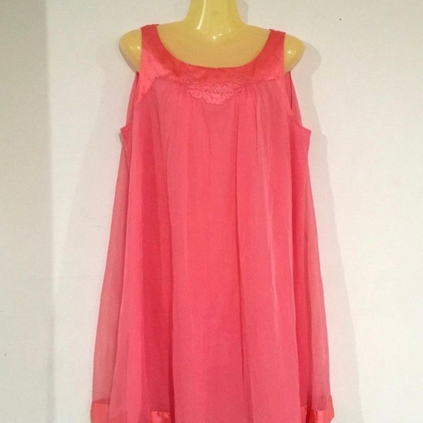 Circa 1950s-60s vintage bubblegum pink babydoll nightie in great condition. Feels like nylon with chiffon overlay.