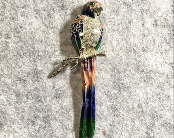 Rhinestone and enamel parrot brooch on silvertone metal, circa 1990s