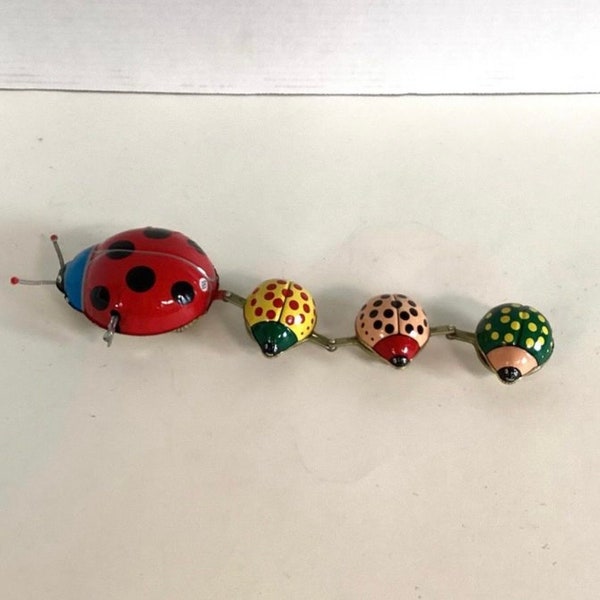 Ladybug Parade wind up tin litho toy with original box. WORKS. 1970s.