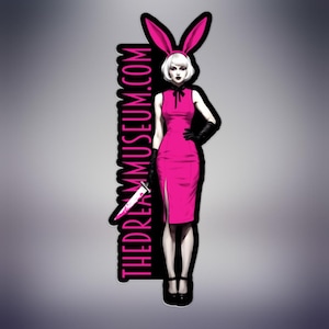May include: A sticker featuring a woman in a pink dress, black gloves, and bunny ears, holding a knife. The text "THEDREAMMUSEUM.COM" is vertically aligned on the left side of the sticker. The woman has white hair and black shoes.
