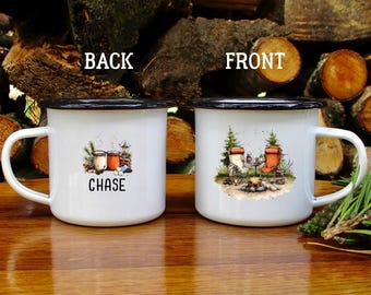 May include: Two white enamel mugs with black rims. The left mug shows the text BACK above a graphic of two mugs and the name CHASE. The right mug shows the text FRONT above a graphic of two camping chairs, a campfire, and pine trees.