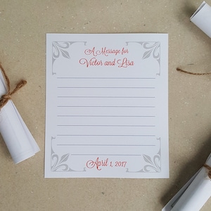 May include: A white card with a gray border and a decorative design in the corners. The card has a red title that says "A Message for Victor and Lisa" and a date that says "April 1, 2017".