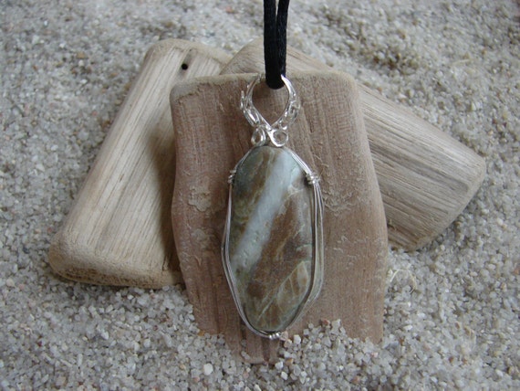 Items similar to Fancy Beach! A beach rock found with jade, and ...