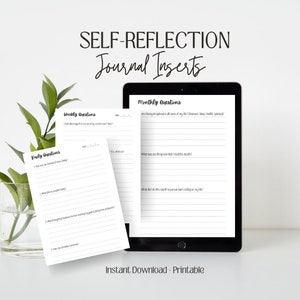 May include: A digital tablet displaying journal inserts with prompts for self-reflection. The image includes daily, weekly, and monthly questions. The text reads "Self-Reflection Journal Inserts" and "Instant Download - Printable."