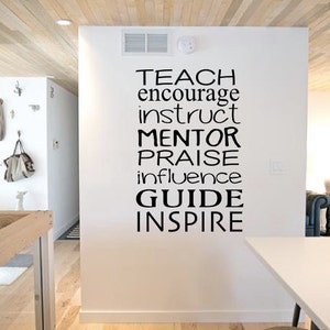 May include: Black and white wall decal with the words "TEACH, encourage, instruct, MENTOR, PRAISE, influence, GUIDE, INSPIRE" in a vertical column.