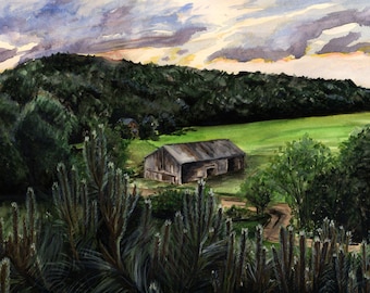 May include: A watercolour painting depicting a wooden barn with a grey roof, situated against a backdrop of a green field and a forest. The sky is a blend of grey and light blue with hints of orange and yellow.