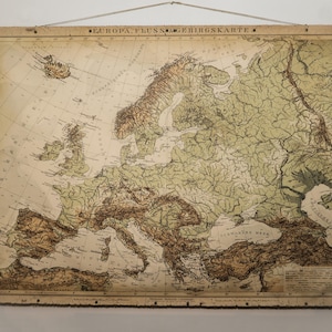 Antiguo mapa topográfico de Europa, detalles de mapa altamente decorativos, material de lona de algodón y clavos de bronce