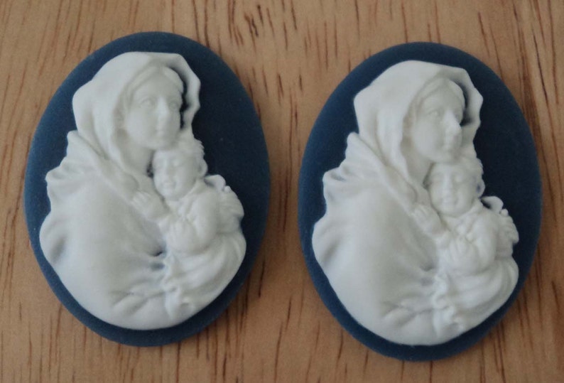 40mm x 30mm oval Virgin Mary with baby Jesus  white on blue image 0