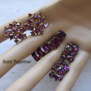 May include: A handmade wooden sign with the text "Welcome" in a playful font. The sign is painted white with a distressed finish, and features a small, decorative heart. It's designed for indoor or outdoor use.