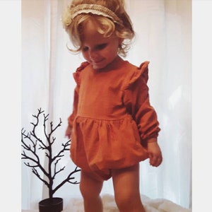 orange romper baby