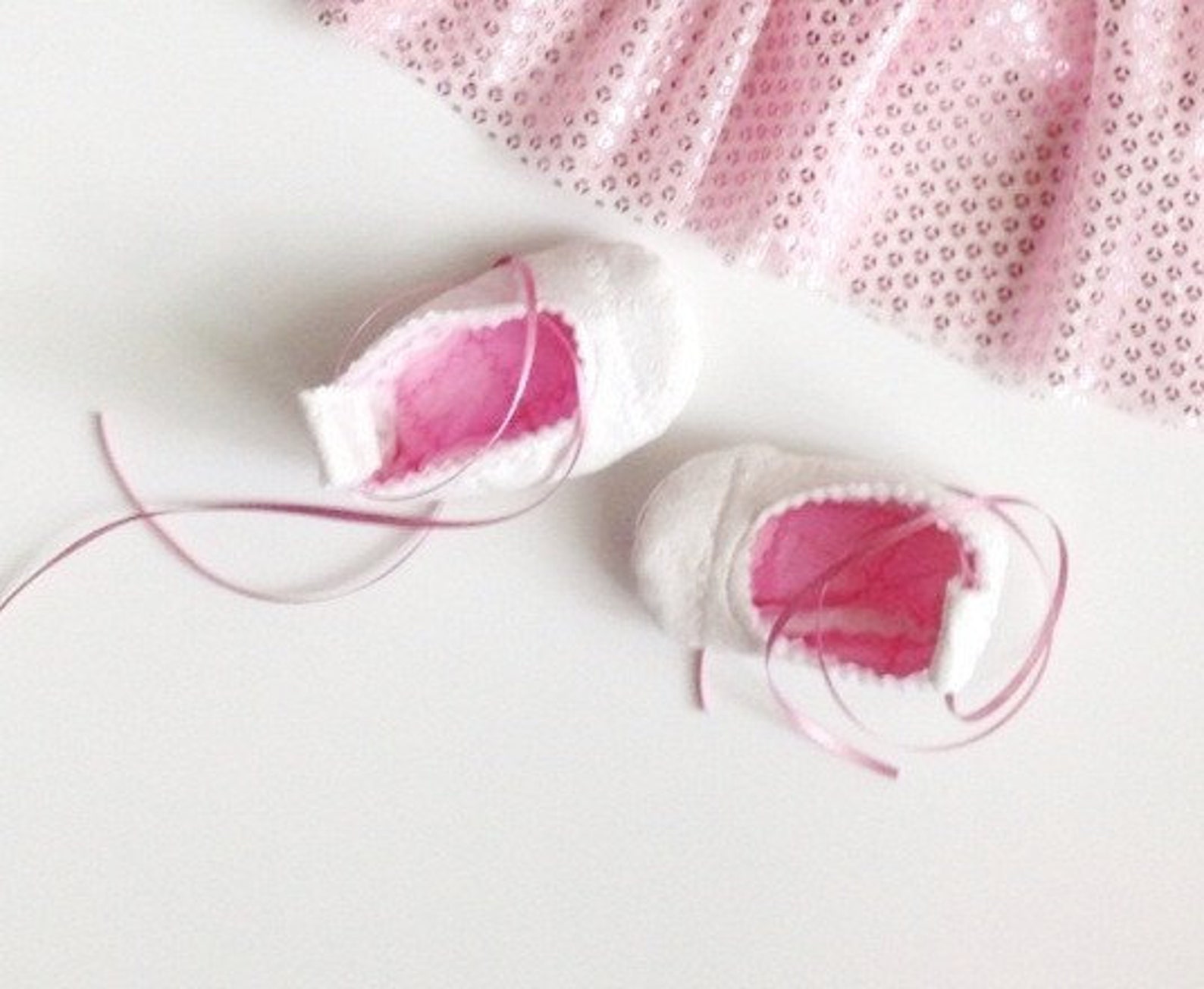 white sparkly baby ballerina slippers with pink sparkly lining, tie up the legs like real ballet flats, great baby gift!