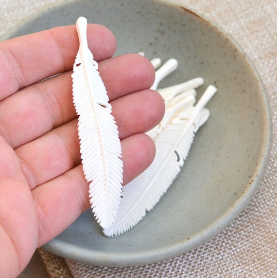 Long Carved Bone Feather Pendant Cow Carving - Bone Carved Feather Pendants Long Carved Bone Feather Pendant Cow Carving - Bone Carved Feather Pendants