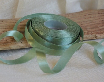 Satin ribbon pale olive silky 1/2 inch wide priced per yard choose your length one sided pale green gift wrap ribbon