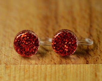 Pendientes de clip de resina brillante con clips de plástico