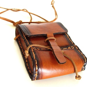 Brown leather bag.