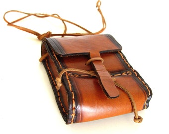 Brown leather bag.