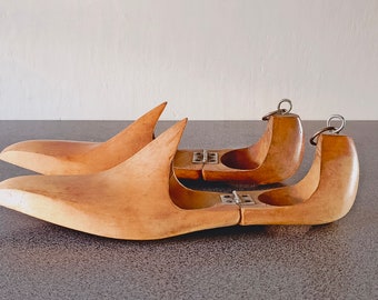 A pair of old shoe molds