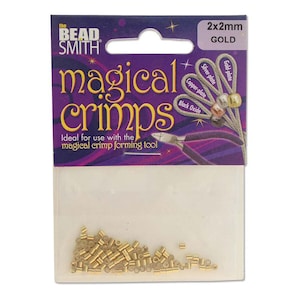 May include: A package of gold-plated 2x2mm crimp beads. The package is labeled "The Bead Smith" and "Magical Crimps".