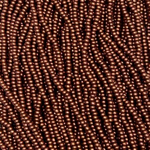 May include: Close-up of a mass of small, round, copper-coloured beads. The beads are strung together, creating a textured, flowing pattern. The beads are uniform in size and have a metallic sheen, suggesting they are made of metal. Ideal for jewellery making.
