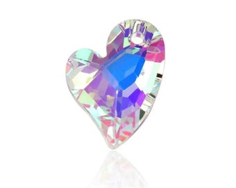 May include: A heart-shaped crystal pendant with a hole at the top for stringing. The crystal is iridescent, displaying a rainbow of colors. The pendant is clear and reflects light.