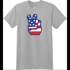 Chemise t-shirt américaine de mains de paix d’indicateur