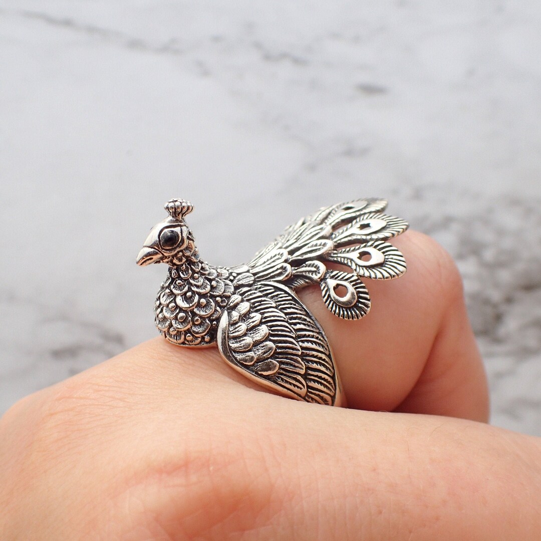 Peacock ring best sale design