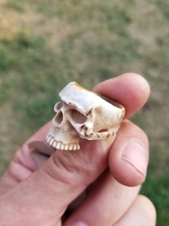 Hand carved half skull ring