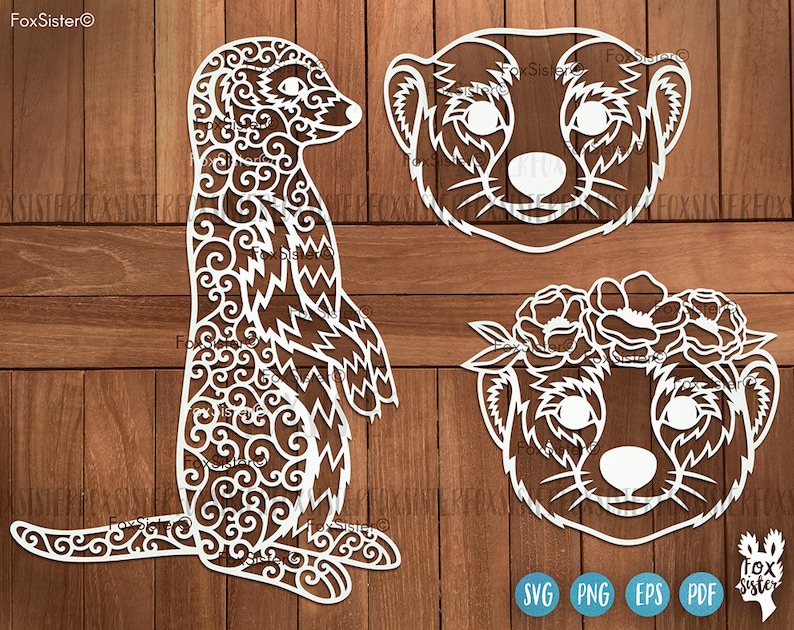 May include: Three white cut-out designs of meerkats with intricate floral patterns. The meerkats are in different poses, including a standing meerkat, a meerkat head, and a meerkat head with a floral crown.