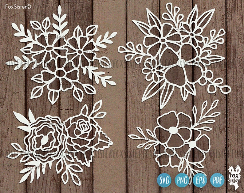 Op de afbeelding: Vier witte, ingewikkelde, uit papier gesneden bloemmotieven. Elk motief heeft een andere opstelling van bloemen en bladeren. De motieven zijn perfect voor knutselen, scrapbooking of decoratie van het huis.