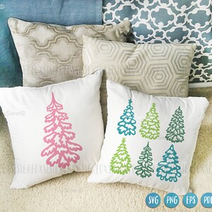 May include: Two white pillowcases with a design of stylized trees. One pillowcase has a pink tree, the other has six trees in shades of green and blue.